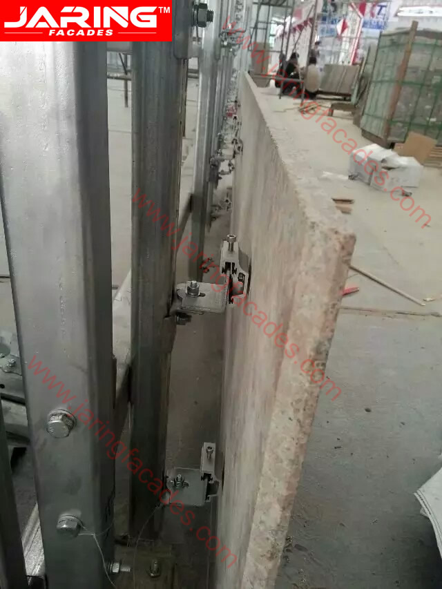 undercut bolt installation for stone panel building facades.jpg